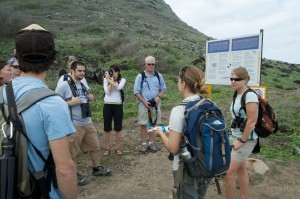 The class gathers to learn about conservation measures at Kaena Pt. 