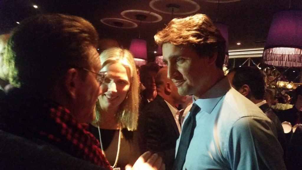 Bono chats with Canadian Prime Minister Justin Trudeau.