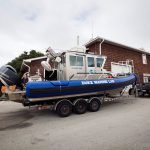 Boats at the Duke Marine Lab being pulled indoors while students and staff evacuated the coastal campus for Hurricane Matthew.