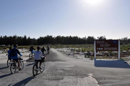 The main form of transportation on the island is by cruiser bicycle. Here is the CEM class riding away from Turtle Beach to head back to Charlie Barracks.